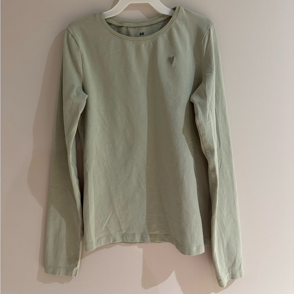 H&M Long Sleeved Mint Green Cotton Top with embroidered heart symbol-size 12/14